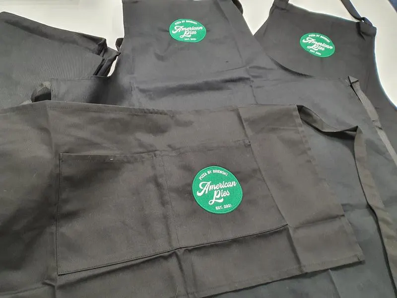 Premium embroidered workwear with custom company logos produced at BPM Print Manchester