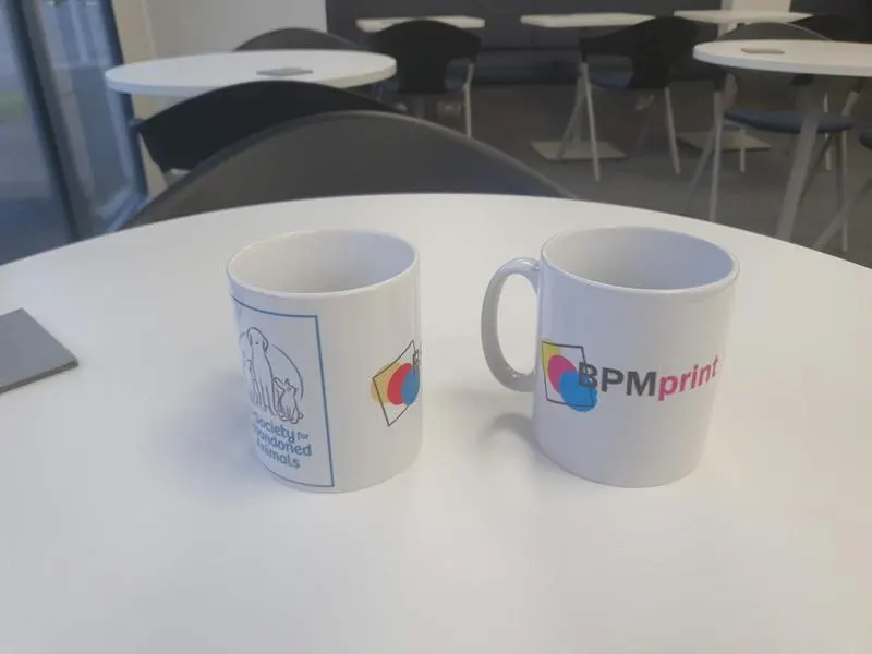 Branded mugs with company logos printed by BPM Print Manchester