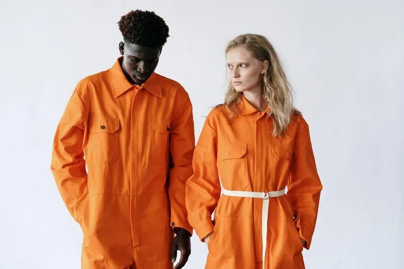 Orange safety workwear coveralls with custom branding